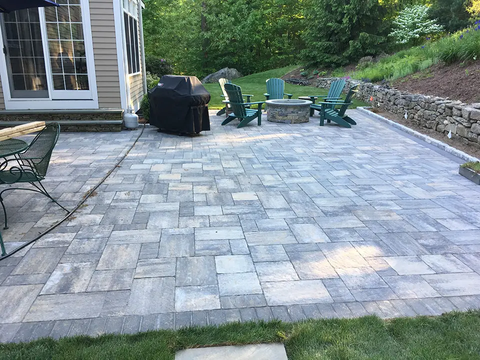 Stone patio and fire pit built by J&M Landscape Design